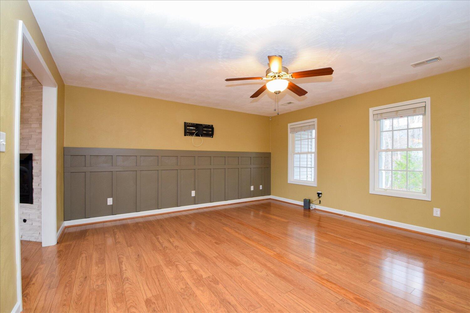 5515 Breckinridge Mill Road Fincastle, VA 24090 - Photo 4 of 31 a view of an empty room with window and a ceiling fan