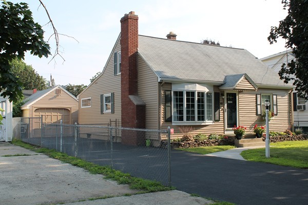 front view of house with a yard