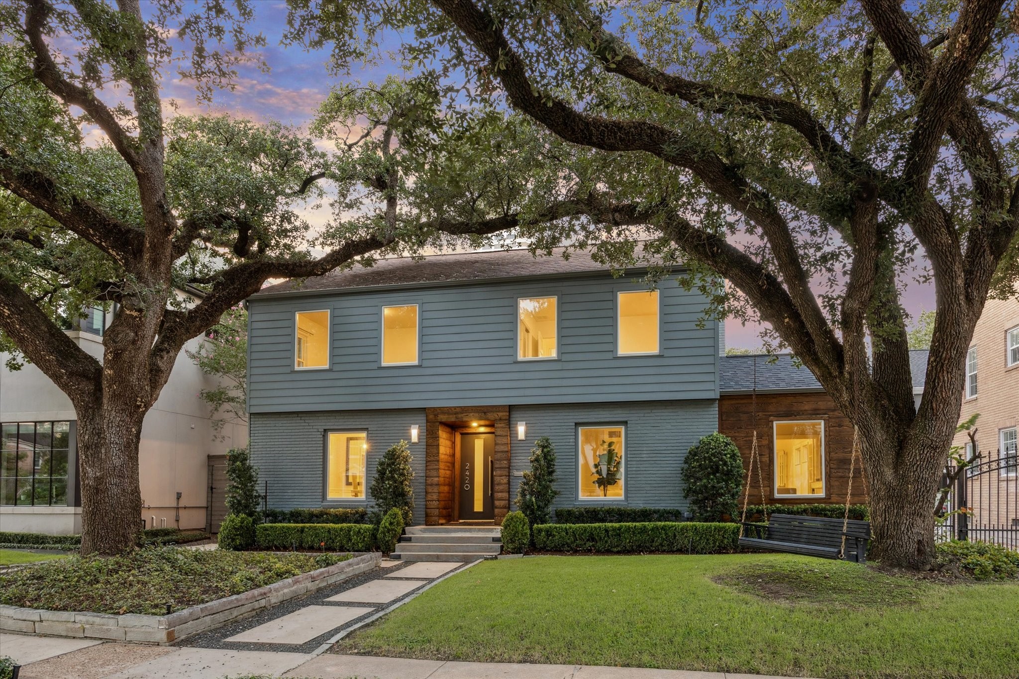 Timeless home with modern interior finishes throughout located in sought after Avalon Place. Beautiful curb appeal with dark rock and paver walkway, two large old-growth trees (one with a swing} and refinished wood trim around the entry.