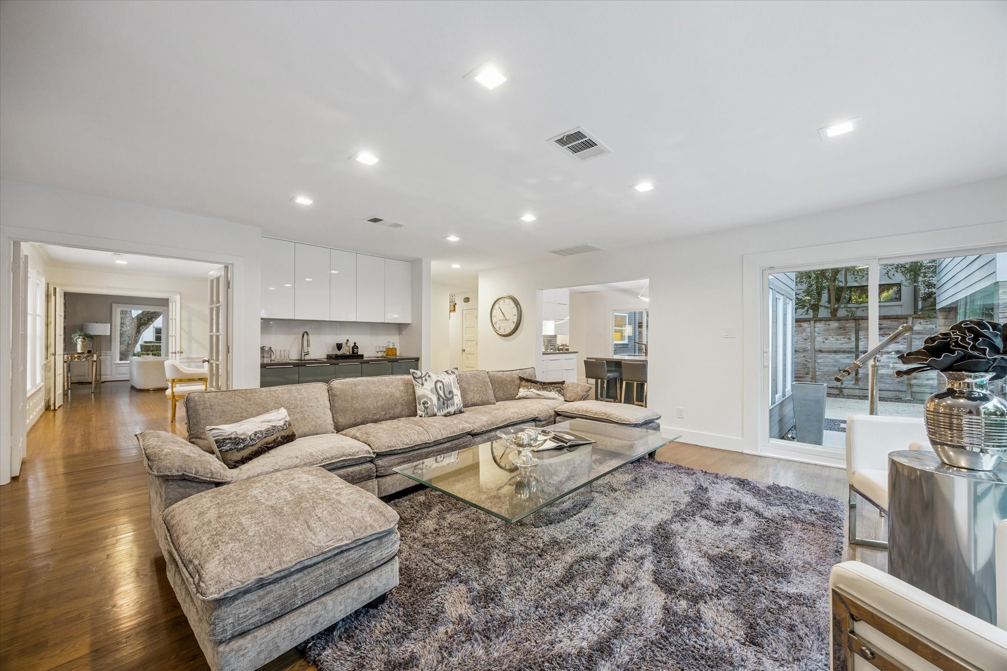2420 Locke Lane Houston, TX 77019 - Photo 15 of 37 Another view of the Family Room showing access to the Study, Main Chef's Kitchen and courtyard area.