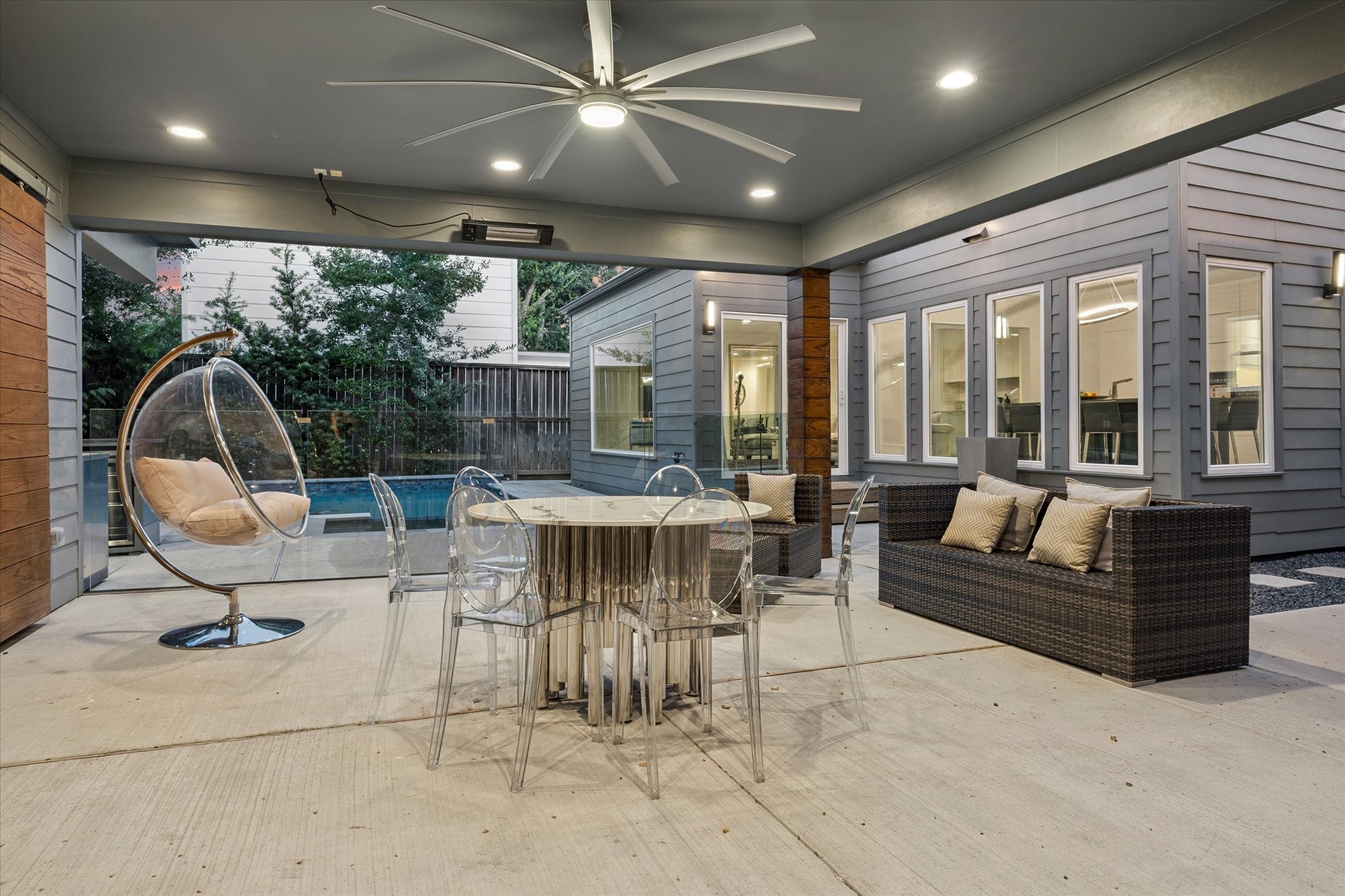 2420 Locke Lane Houston, TX 77019 - Photo 31 of 37 Another view of the covered patio looking towards the pool and rear of the house.