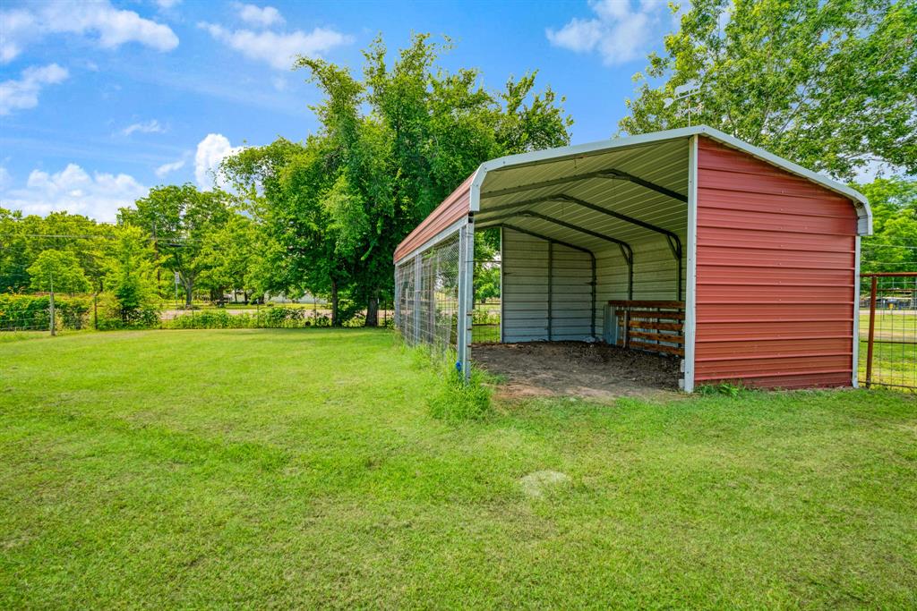 735 1st Southwest Detroit, TX 75436 - Photo 21 of 26 a view of a house with backyard