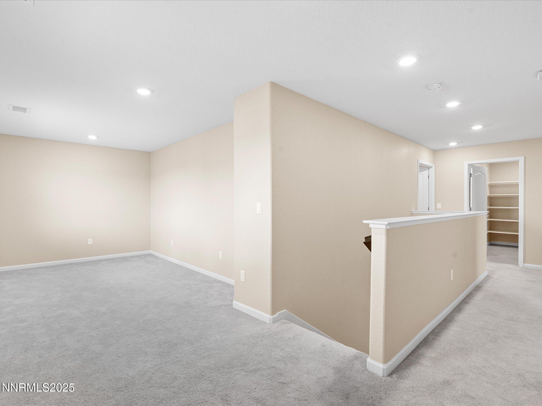 8933 Quail Falls Drive Reno, NV 89506 - Photo 11 of 22 a view of an empty room