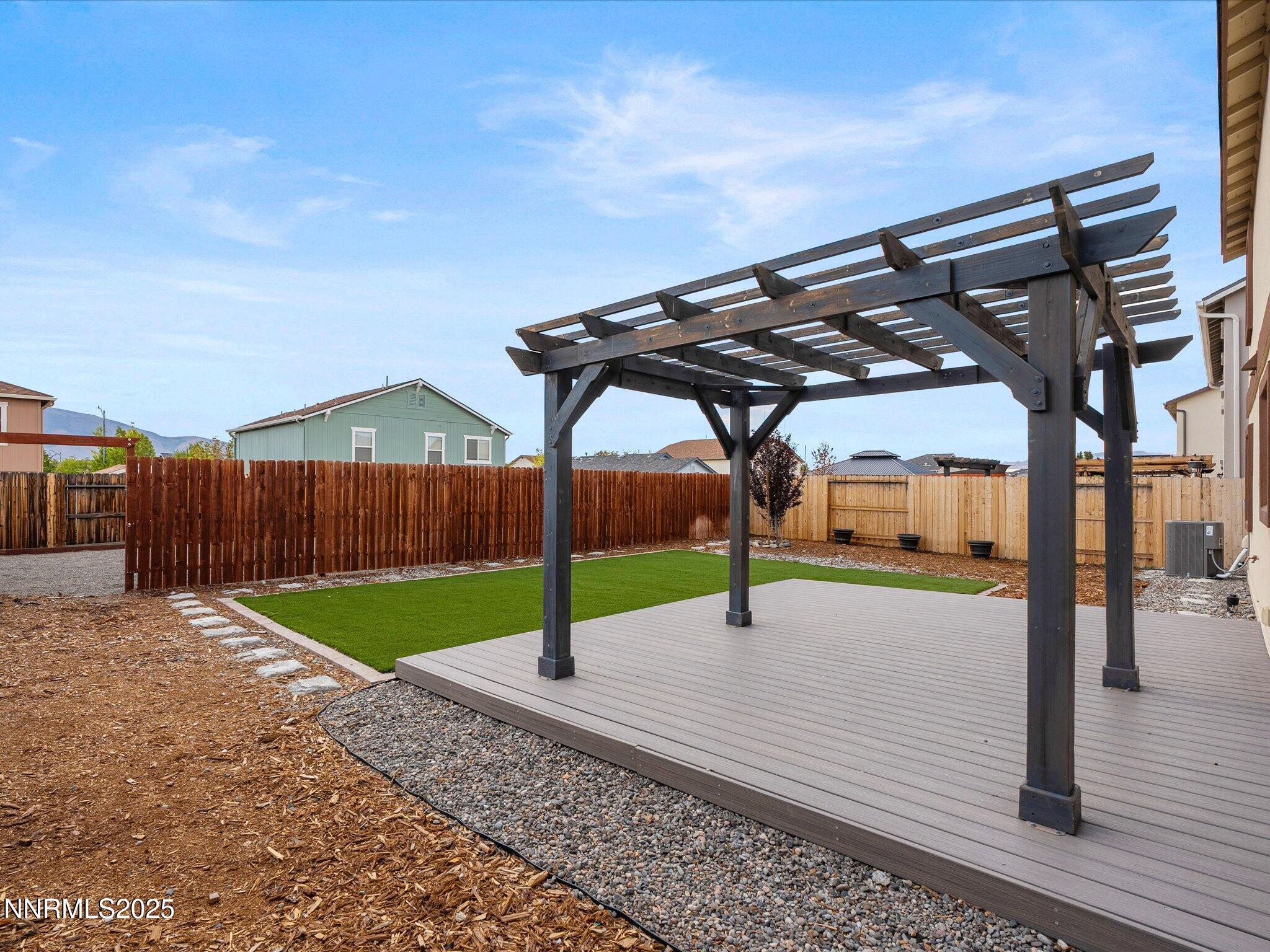 8933 Quail Falls Drive Reno, NV 89506 - Photo 17 of 22 a view of a backyard