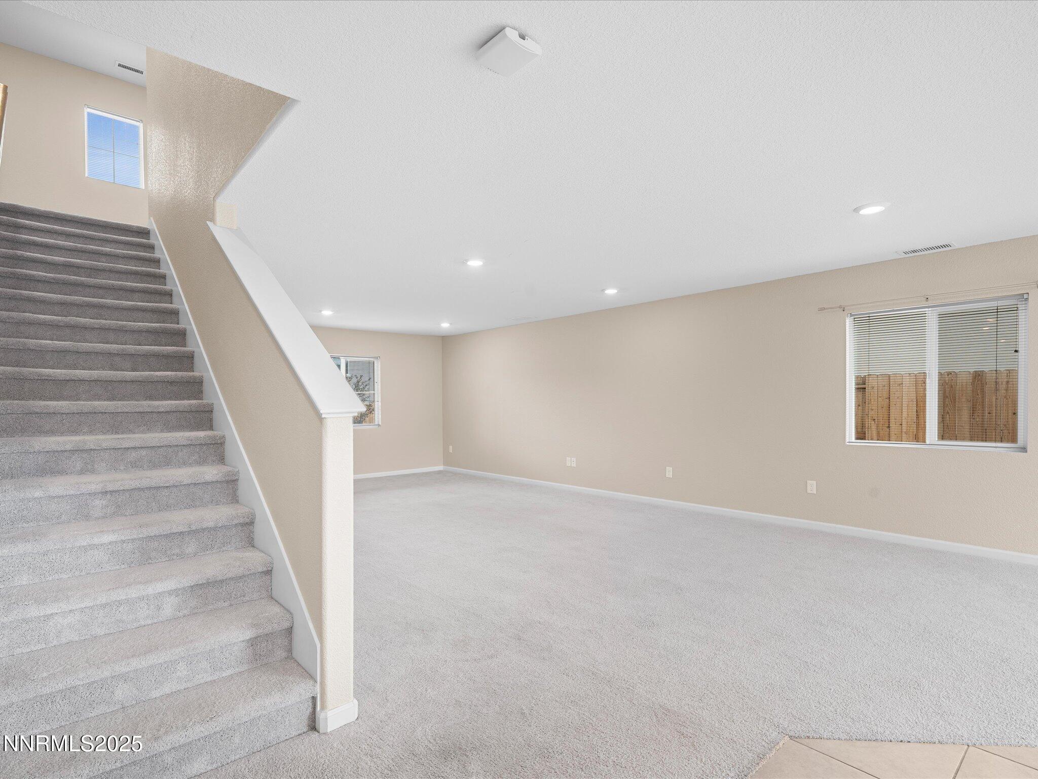8933 Quail Falls Drive Reno, NV 89506 - Photo 8 of 22 a view of staircase with white walls
