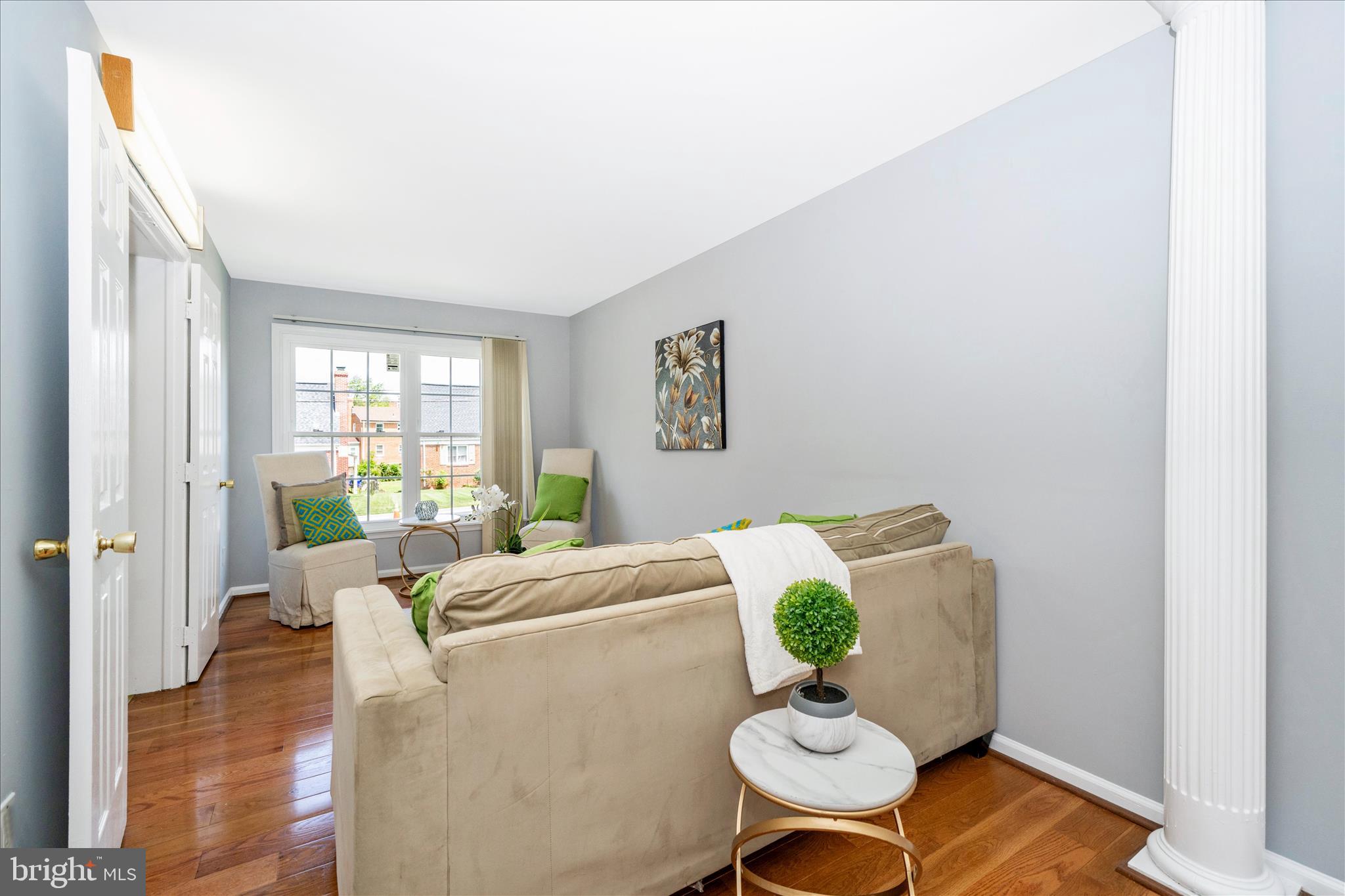 713 Seek Lane Silver Spring, MD 20912 - Photo 17 of 60 a living room with furniture and a table