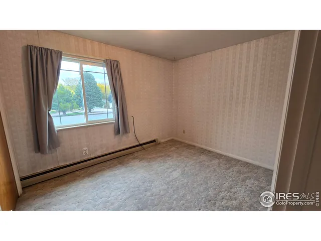 a open hall with a bench