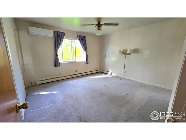 a black and white photo of a living room