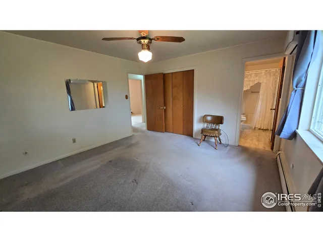 a bathroom with a sink a mirror and a shower