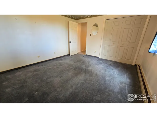 a black and white photo of a living room