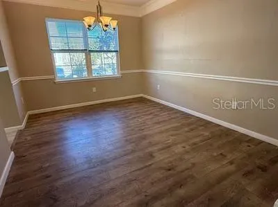 a kitchen with stainless steel appliances granite countertop a stove a refrigerator and a sink