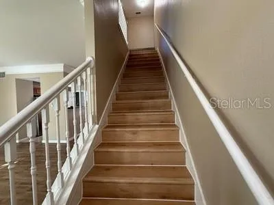 a front view of a house with a yard and pathway