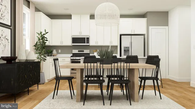 a view of a dining room with furniture