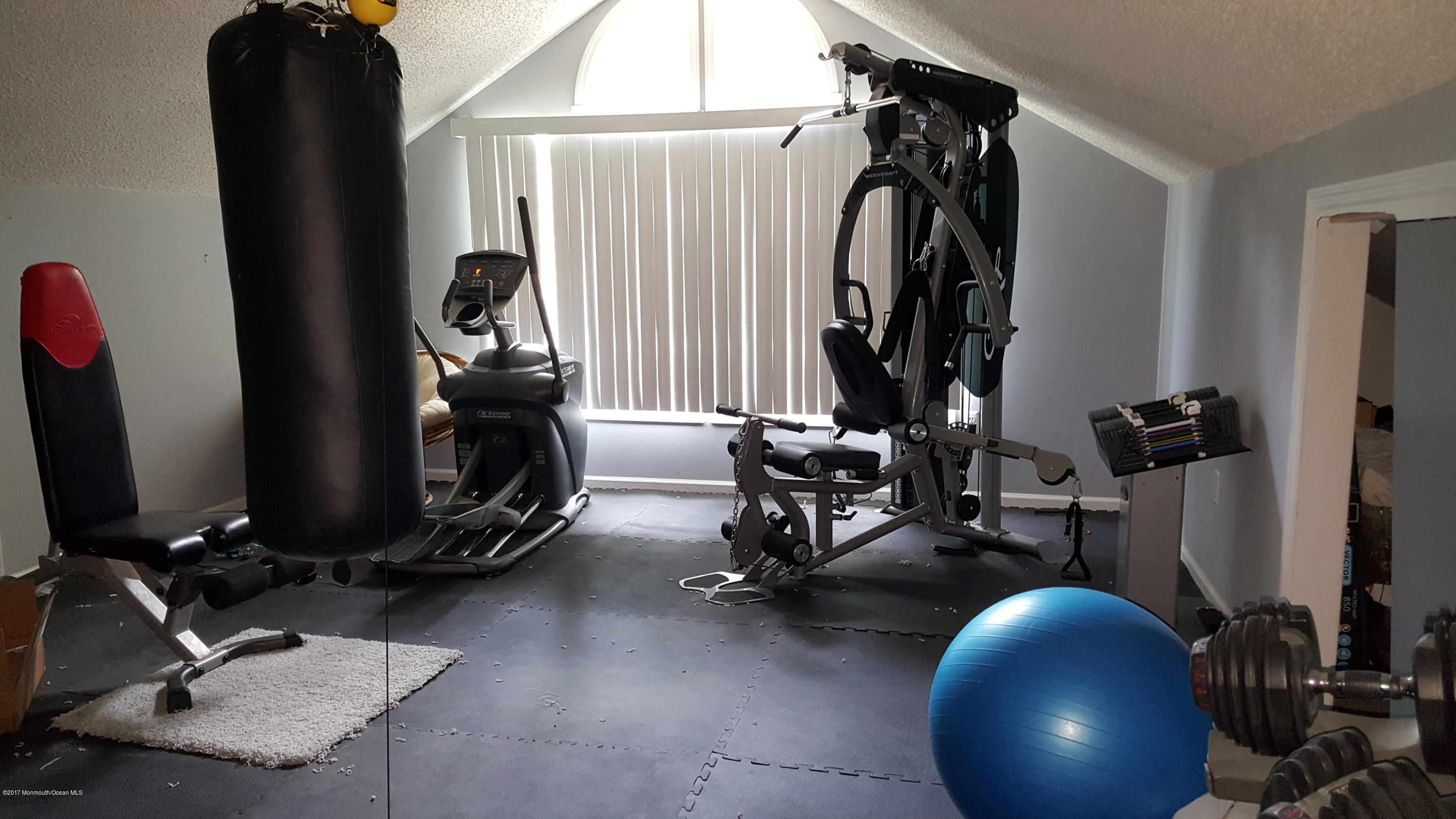 21 Jumping Brook Road Neptune Township, NJ 07753 - Photo 13 of 20 a view of a room with gym equipment