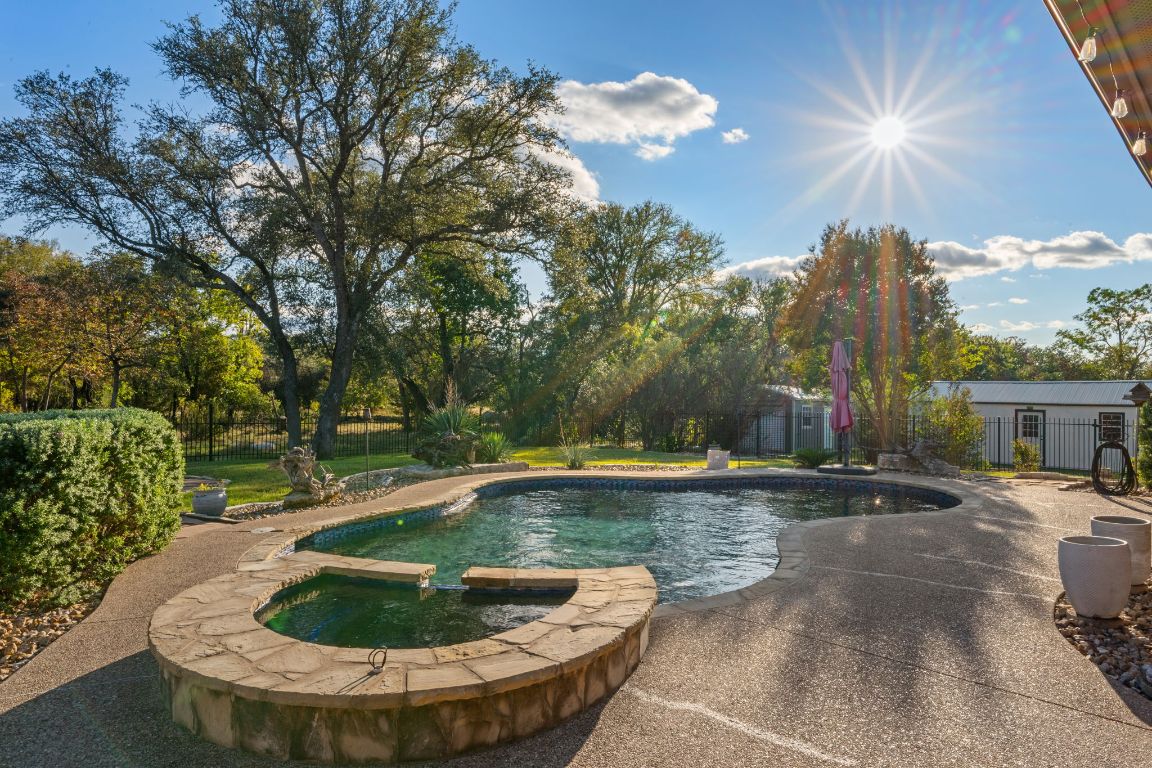 686 Benchmark Trail Belton, TX 76513 - Photo 27 of 38 a view of a swimming pool with a patio