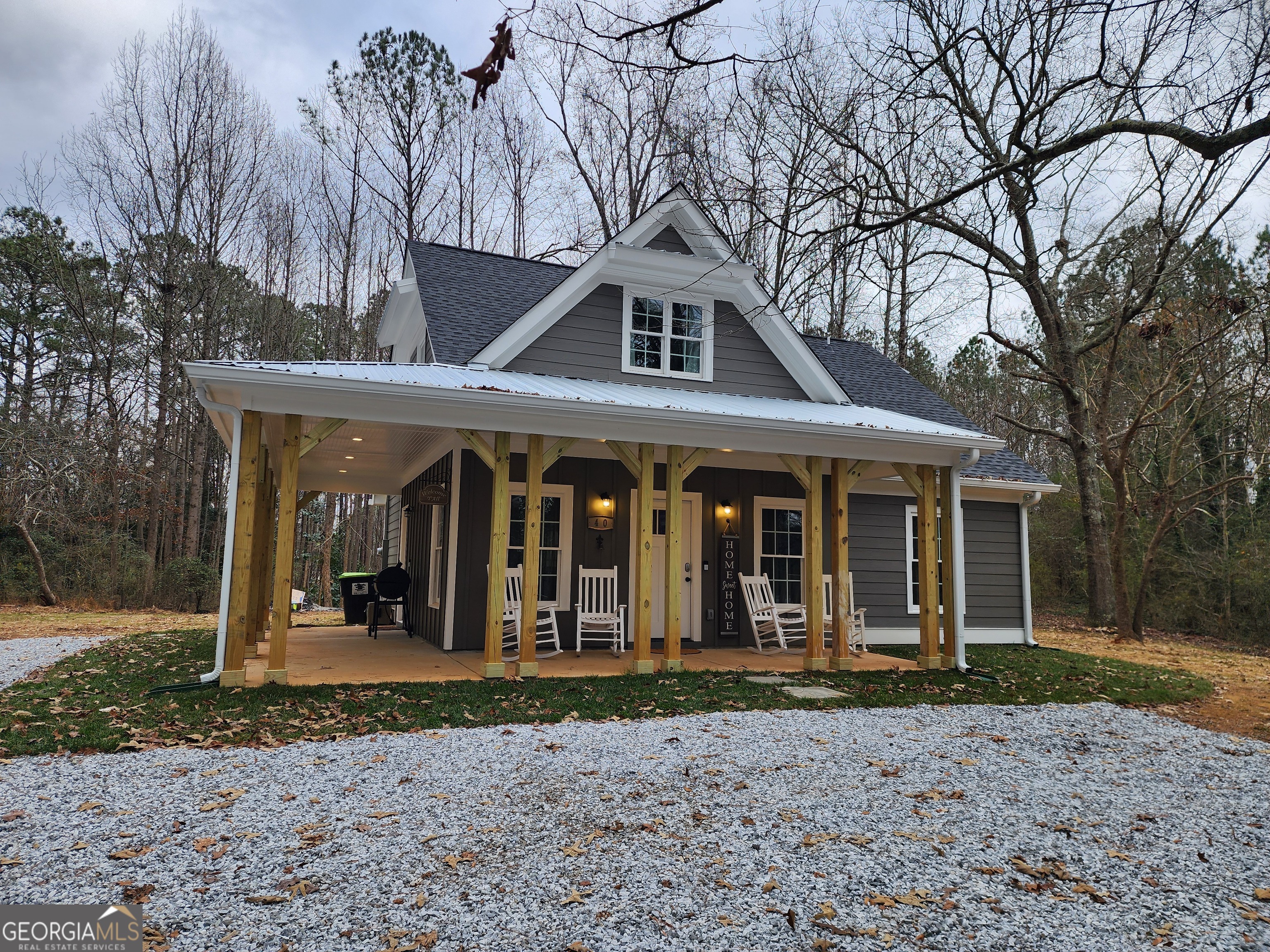 40 Luther Knight Road Southeast Cartersville, GA 30121 - Photo 17 of 22 a front view of a house with garden