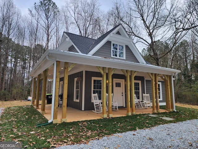 a front view of a house with a porch