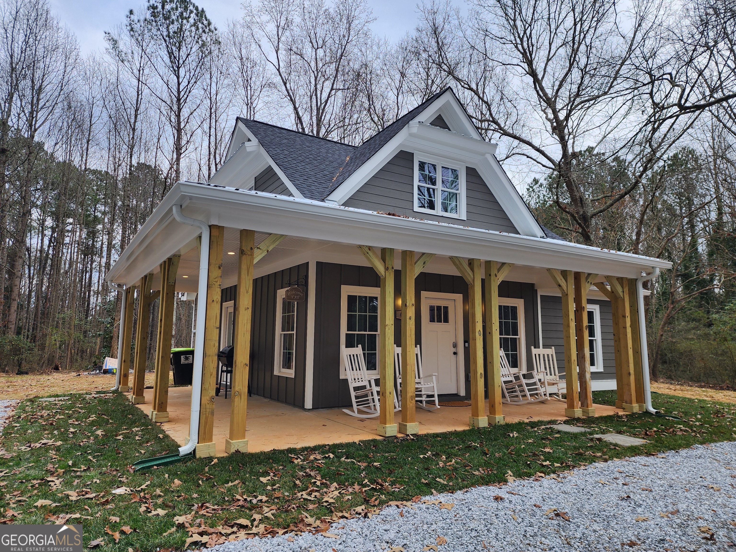 40 Luther Knight Road Southeast Cartersville, GA 30121 - Photo 18 of 22 a front view of a house with a porch