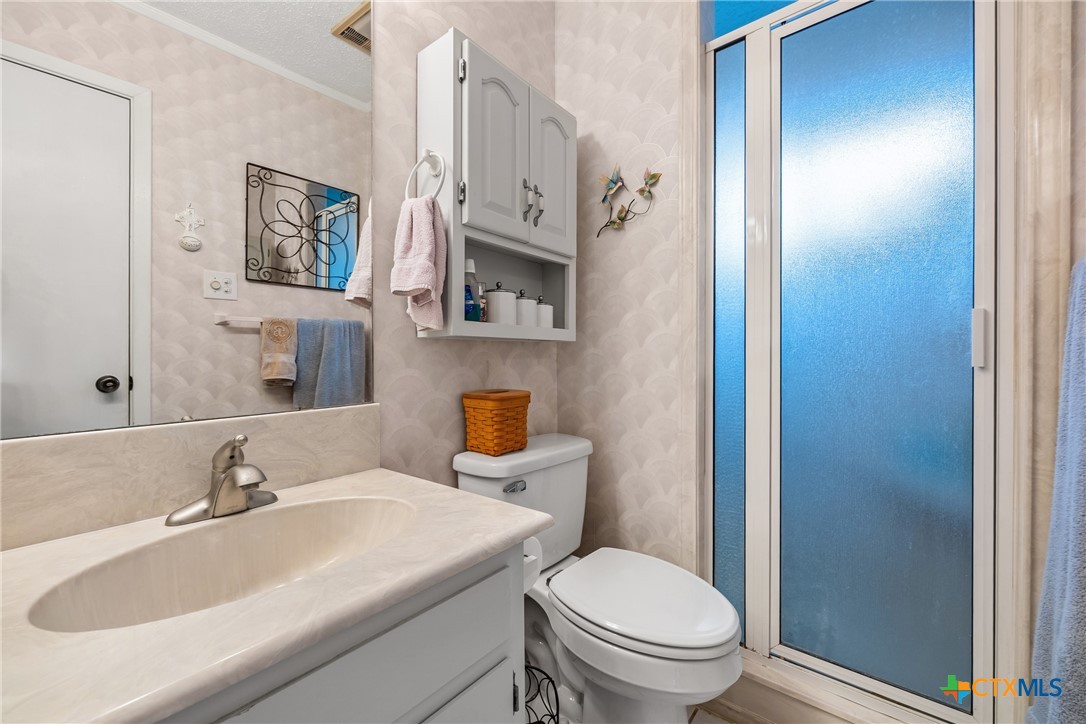 3909 Fairway Drive Temple, TX 76502 - Photo 12 of 24 a bathroom with a sink a toilet and shower