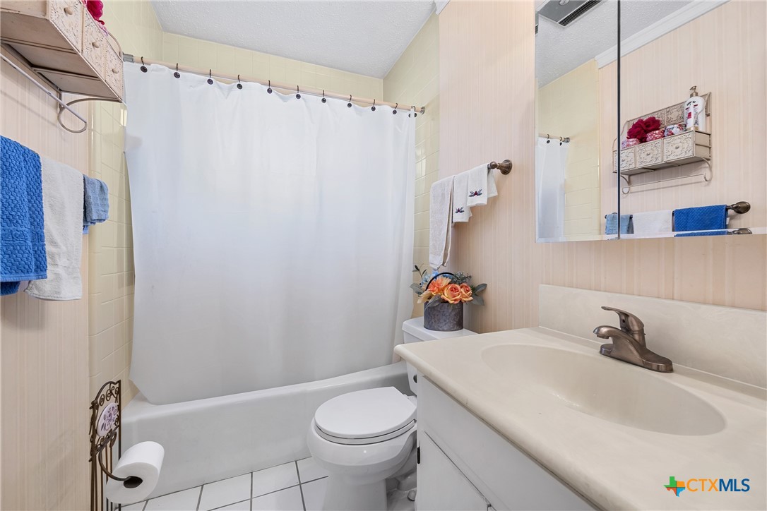 3909 Fairway Drive Temple, TX 76502 - Photo 15 of 24 a bathroom with a sink toilet and shower