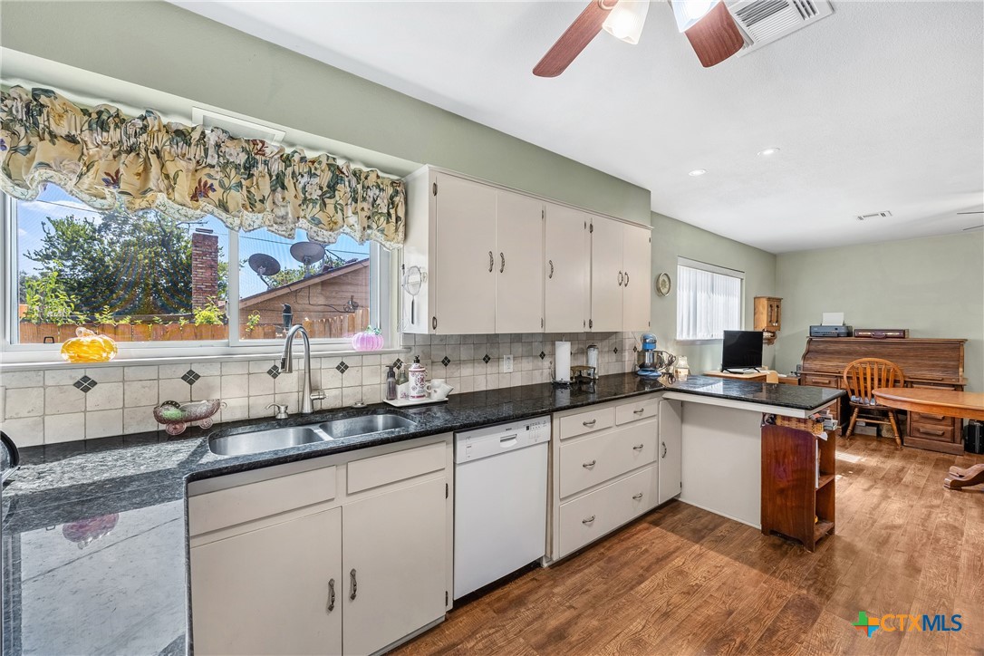 3909 Fairway Drive Temple, TX 76502 - Photo 8 of 24 a kitchen with sink and cabinets