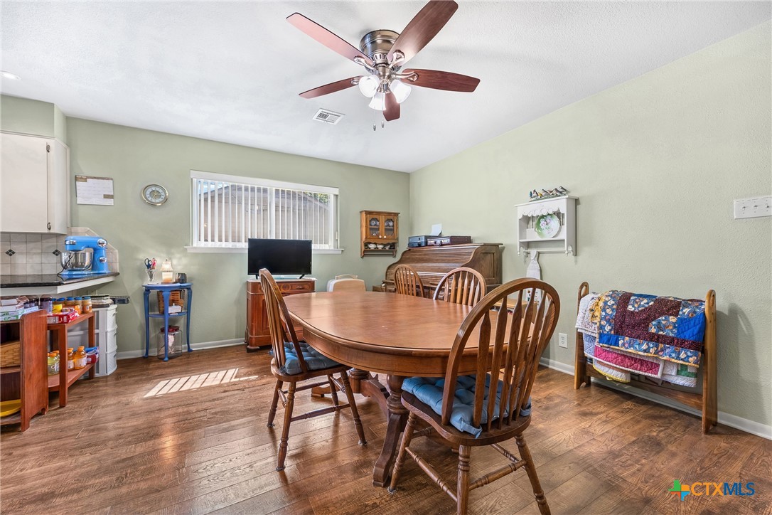 3909 Fairway Drive Temple, TX 76502 - Photo 9 of 24 a living room with furniture and a flat screen tv