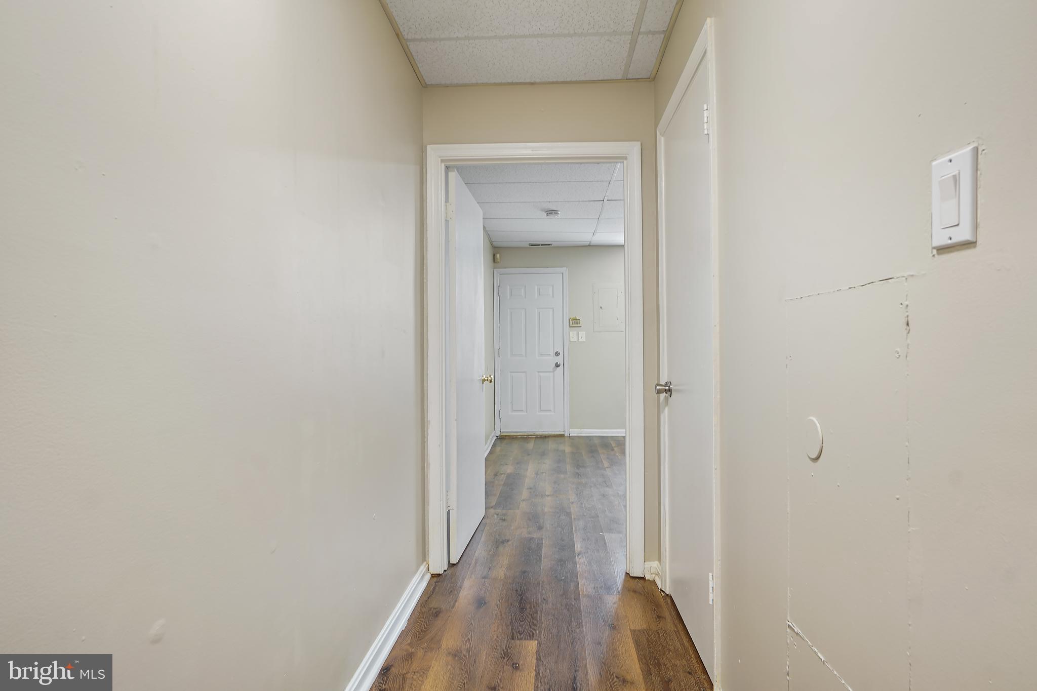 2645 North Charles Street, Unit B Baltimore, MD 21218 - Photo 20 of 30 a view of a hallway with wooden floor