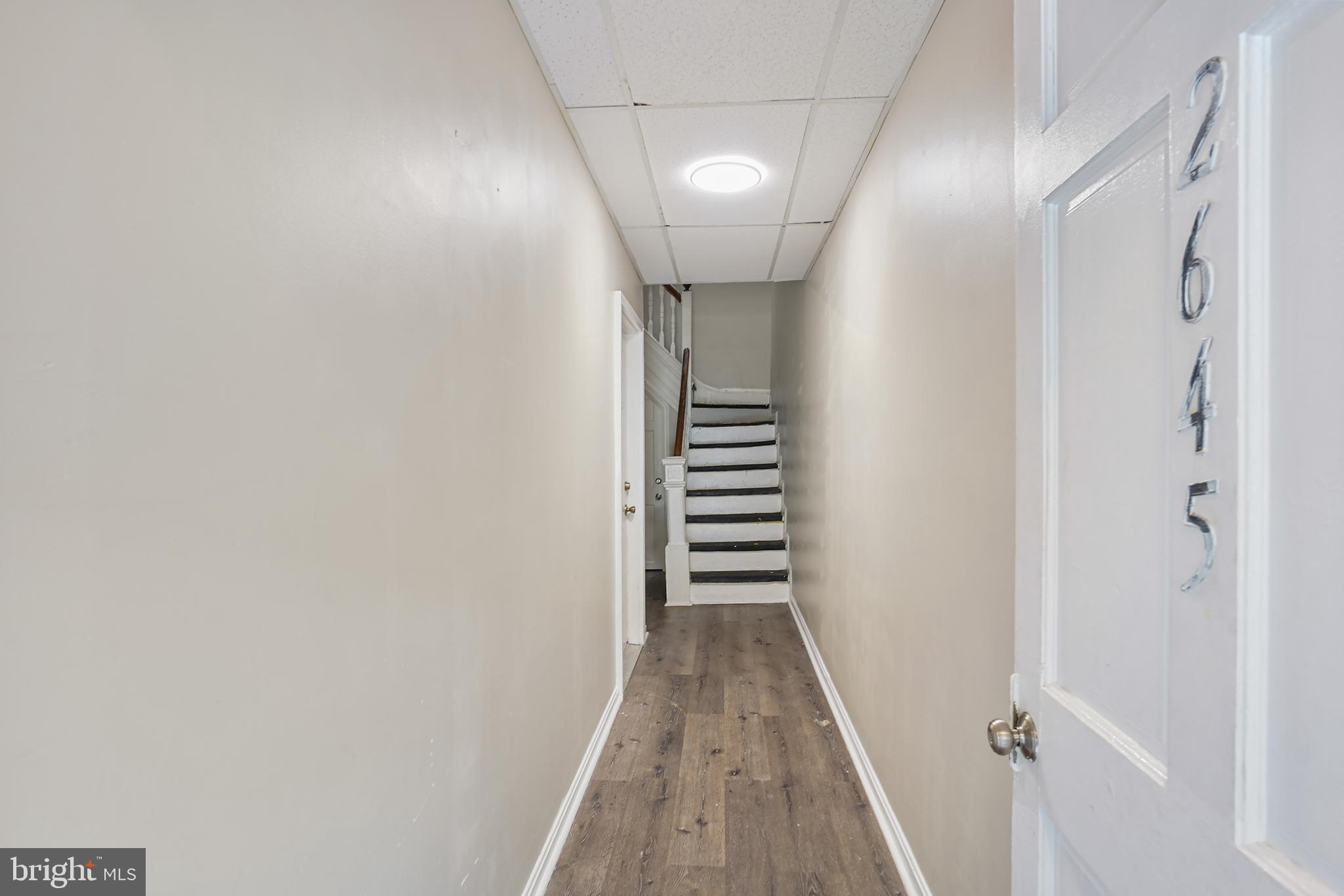 2645 North Charles Street, Unit B Baltimore, MD 21218 - Photo 5 of 30 a view of a hallway with wooden floor