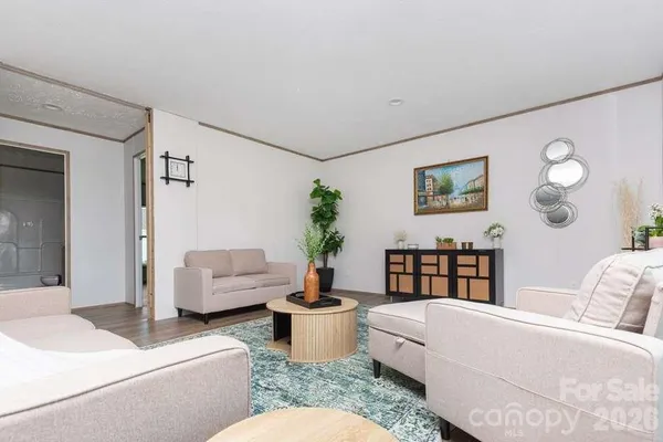 a living room with furniture and a couch