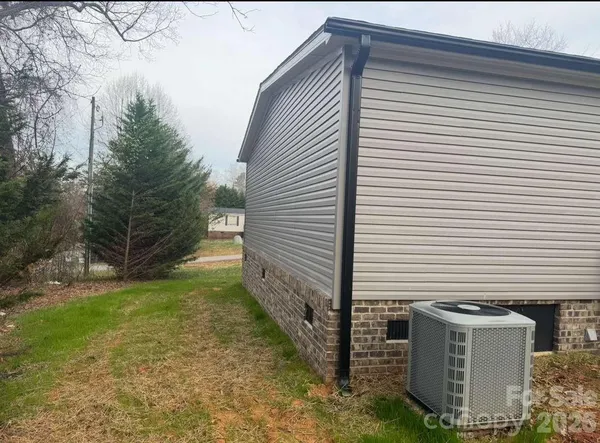 a view of a backyard with plants