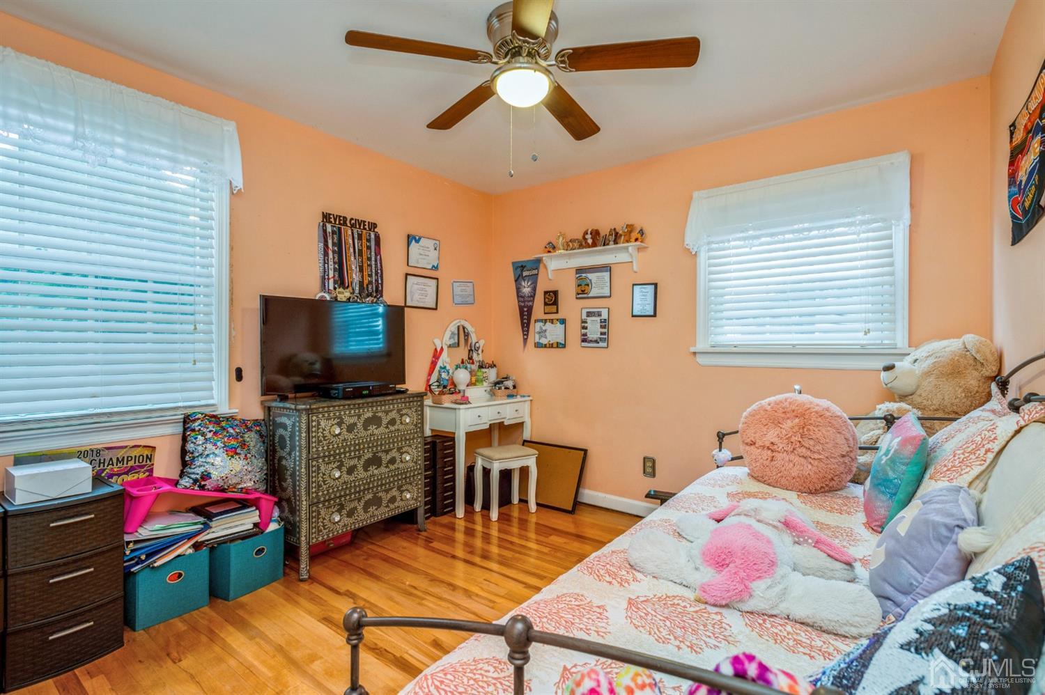 17 Longview Road Old Bridge, NJ 08857 - Photo 11 of 18 a bedroom with furniture and a flat screen tv