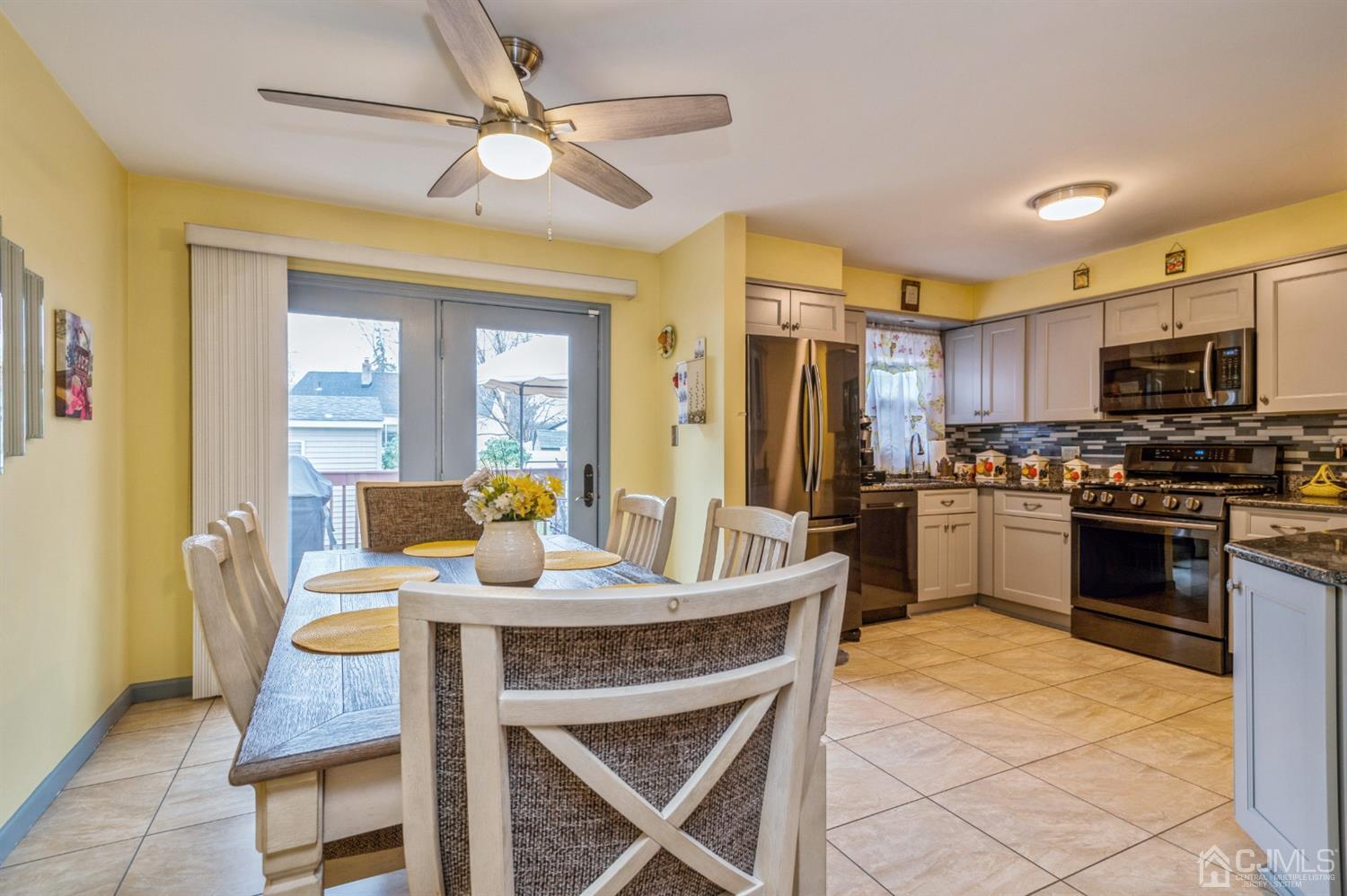 17 Longview Road Old Bridge, NJ 08857 - Photo 4 of 18 a kitchen with a dining table and chairs