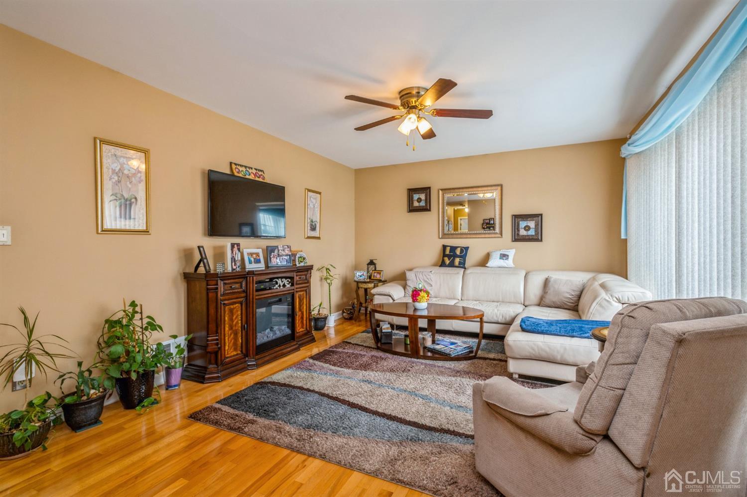 17 Longview Road Old Bridge, NJ 08857 - Photo 6 of 18 a living room with furniture and a flat screen tv