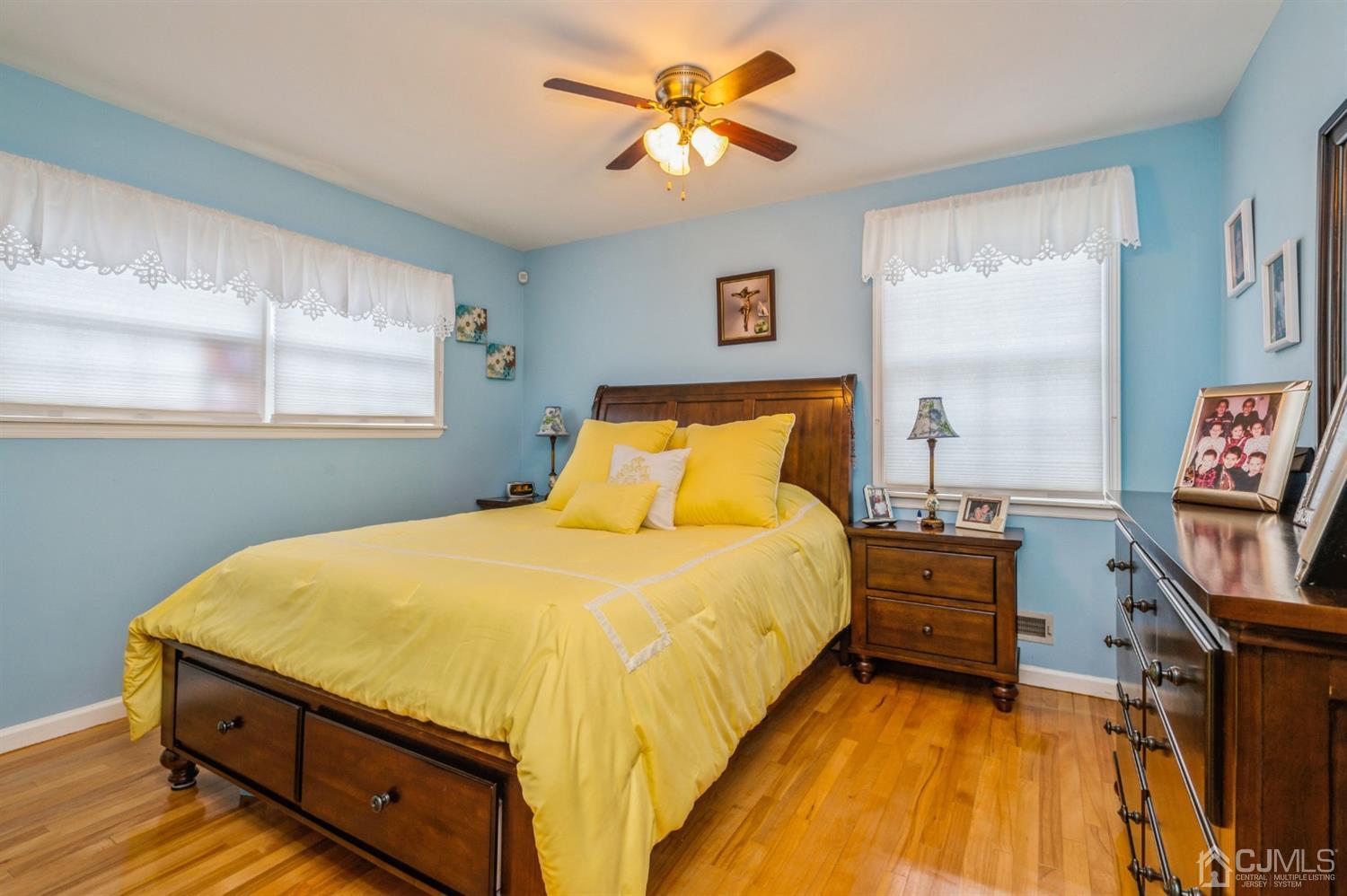 17 Longview Road Old Bridge, NJ 08857 - Photo 9 of 18 a bedroom with a bed and a flat tv screen on the dresser