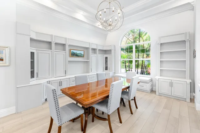 a spacious bathroom with a granite countertop sink mirror and a