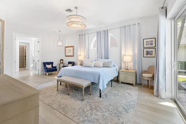 a view of work space with wooden floor and a window
