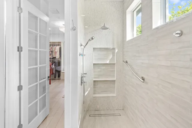 a view of storage and utility room with washer and dryer
