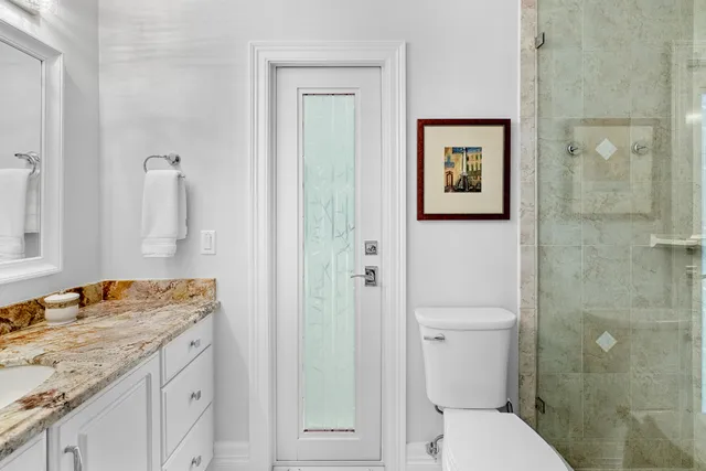 a view of a backyard with a swimming pool