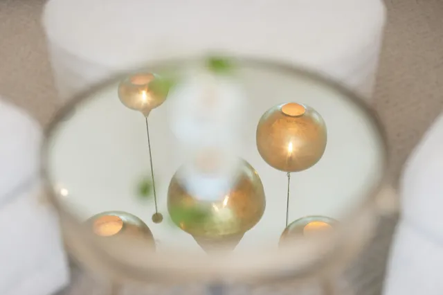 a kitchen with white cabinets and appliances