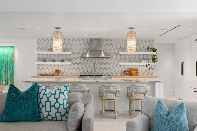 a bedroom with a bed and a lamp