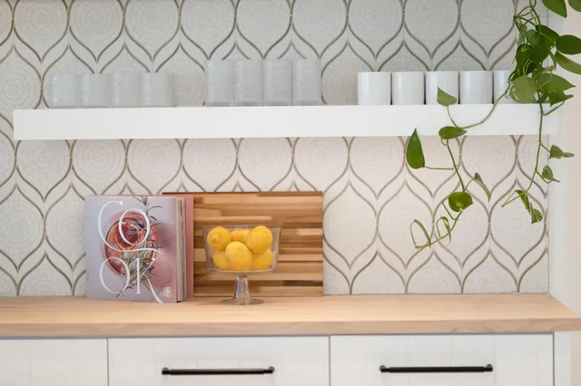 a vase of flowers sitting on a table