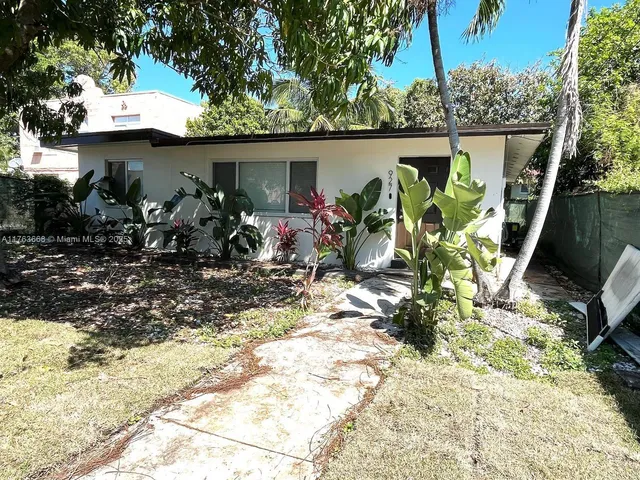 a view of a house with garden