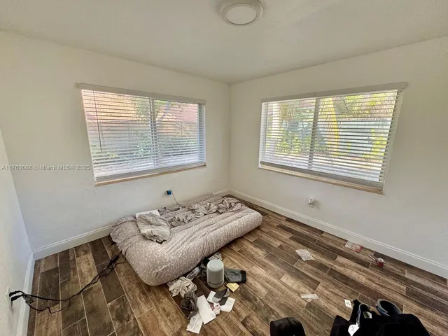 a view of a workspace with furniture