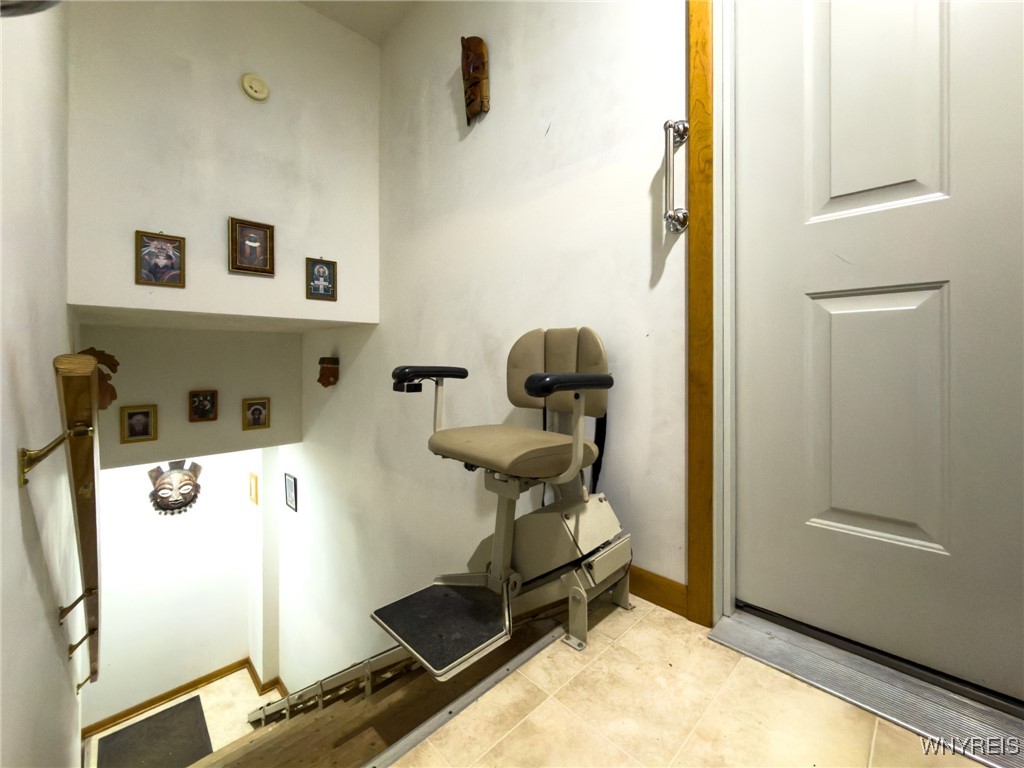 2245 Thomas Road Sheldon, NY 14167 - Photo 13 of 39 Chair lift accessible to either unit.