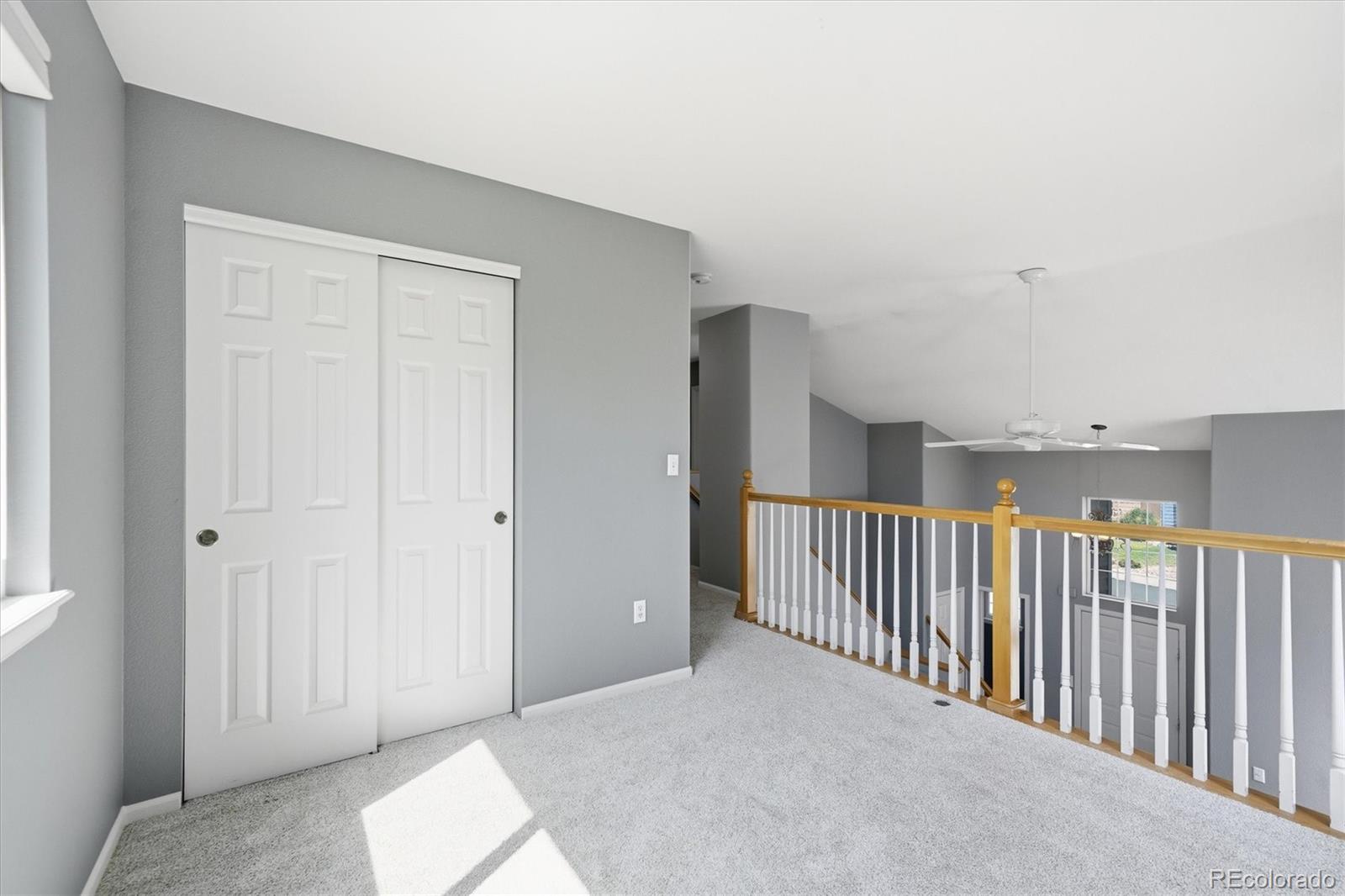 9629 Burberry Way Highlands Ranch, CO 80129 - Photo 22 of 50 a view of a hallway