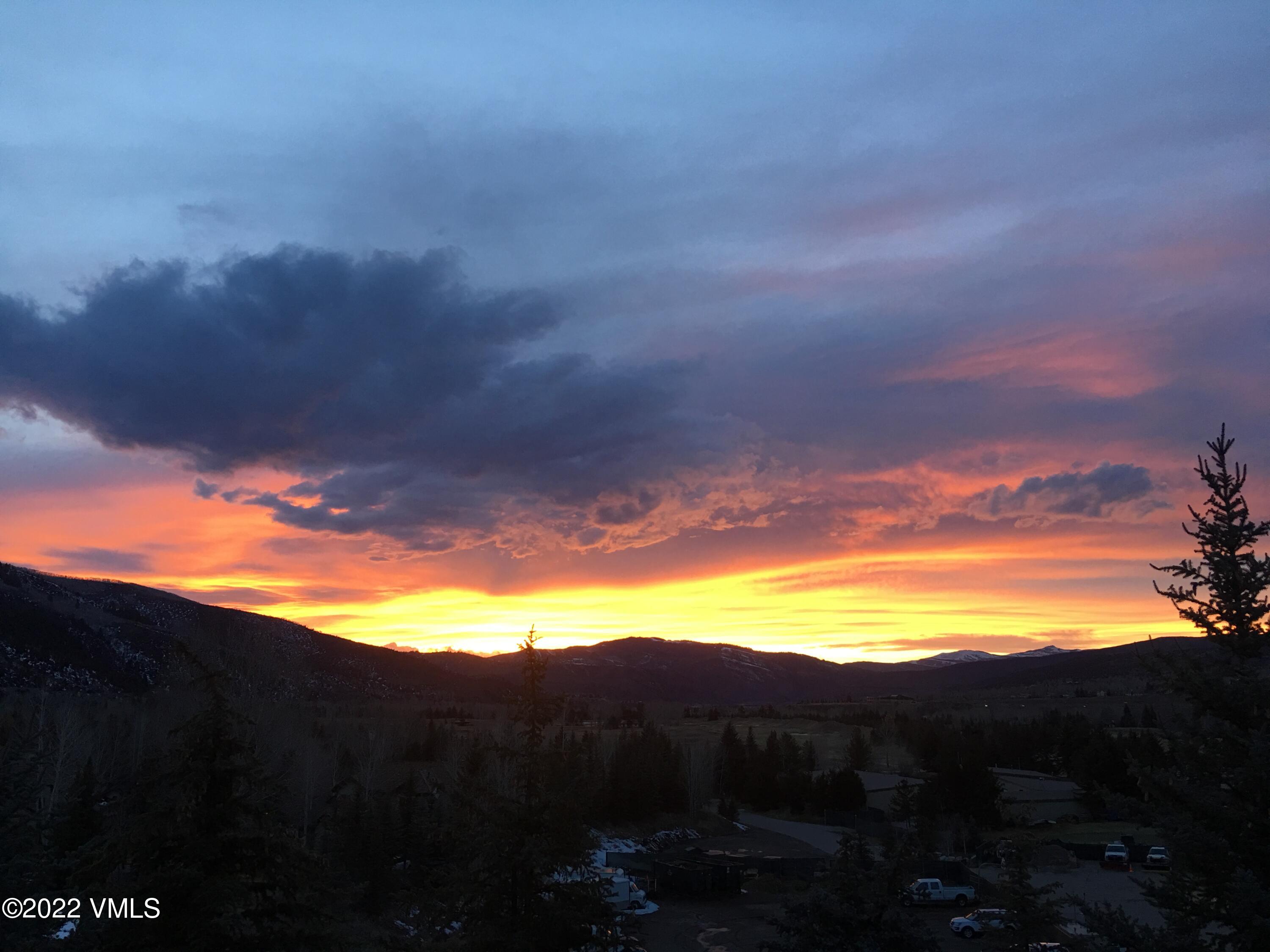 53 Knudson Ranch Road Edwards, CO 81632 - Photo 19 of 19 a view of sunset and yard