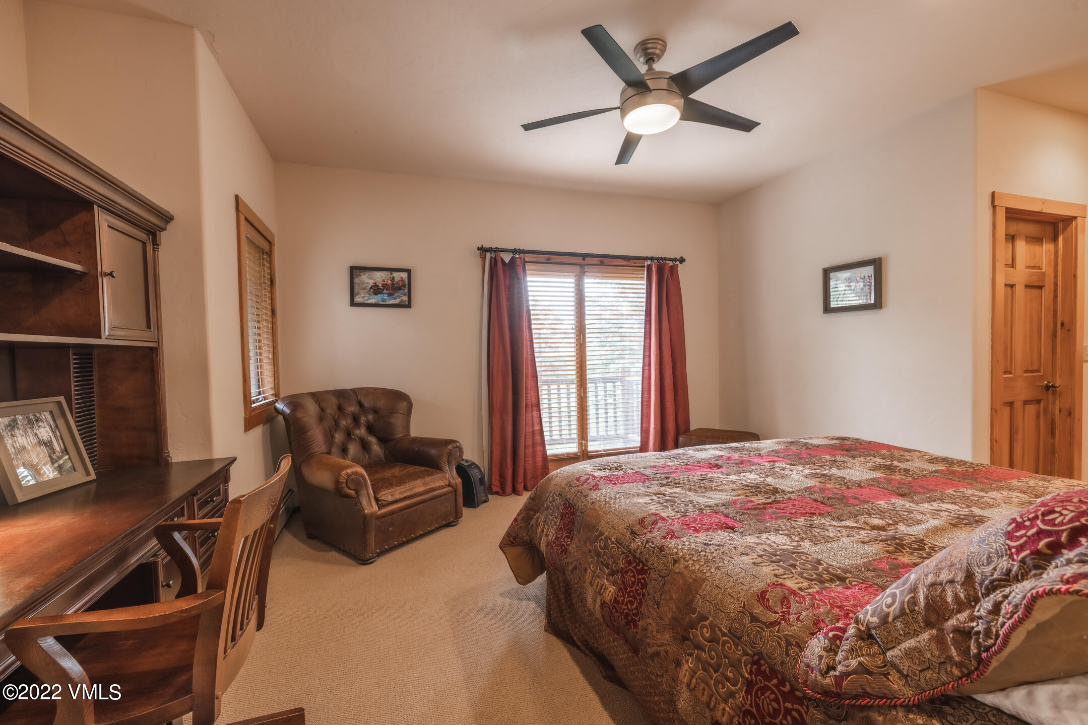 53 Knudson Ranch Road Edwards, CO 81632 - Photo 10 of 19 a bedroom with a bed gym equipment and a window