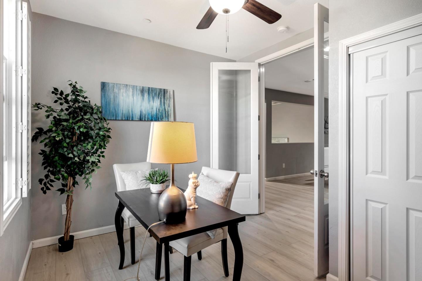 1814 Snell Place Milpitas, CA 95035 - Photo 22 of 49 a living room with furniture and a potted plant