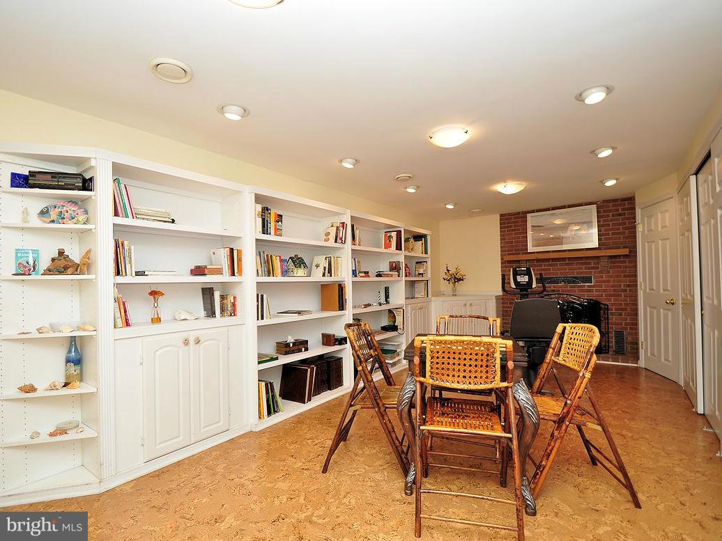 8403 High Ridge Road Ellicott City, MD 21043 - Photo 16 of 29 Lower Level Family Room With Built-Ins