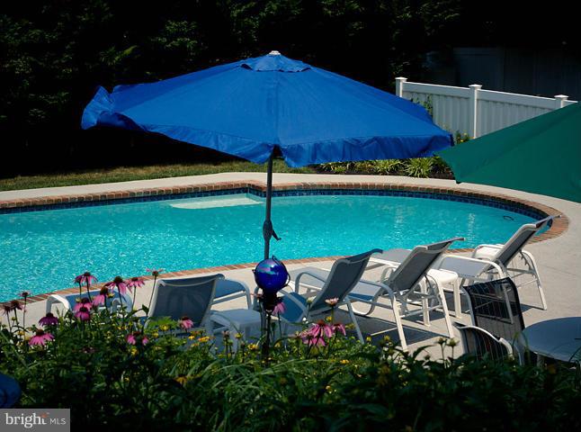 8403 High Ridge Road Ellicott City, MD 21043 - Photo 28 of 29 Plenty of Room to Relax Poolside